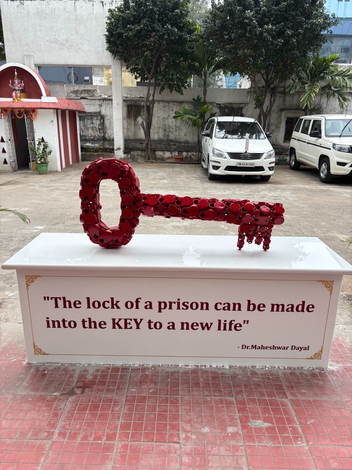 Key sculpture at prison with Dr. Maheshwar Dayal's quote on reform